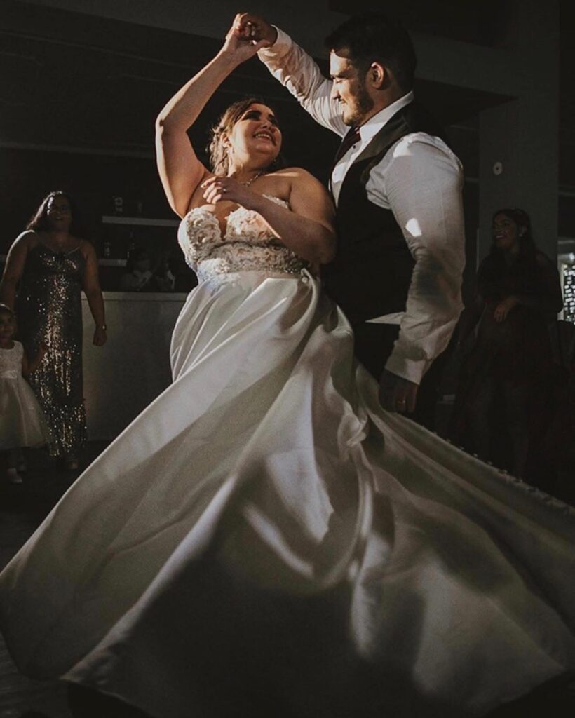 Supportive bridal alterations London during wedding reception dancing