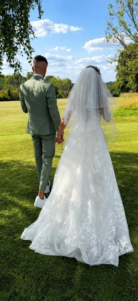 Lace wedding dress with custom split and appliqué balancing work