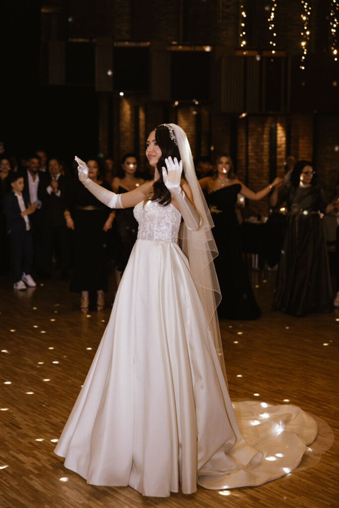 Dancing bride in her Wona Concept bridal dress