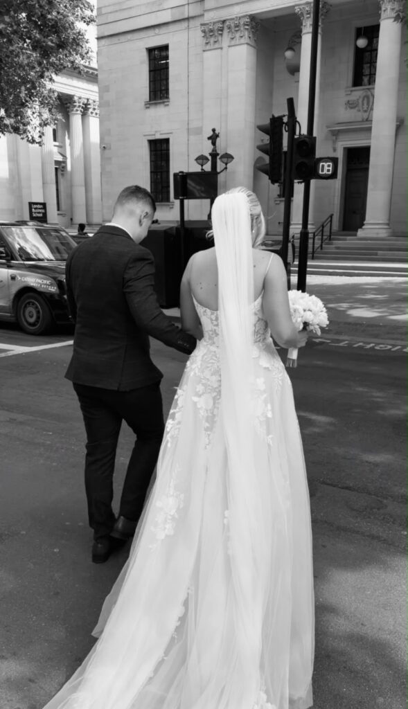 Adjustments on dress for a real bride on her wedding day