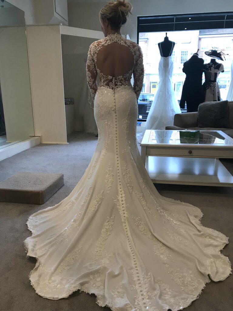 Stella York 6916 wedding dress after couture bridal alterations showing sleeves  illusion bodice and open back full view