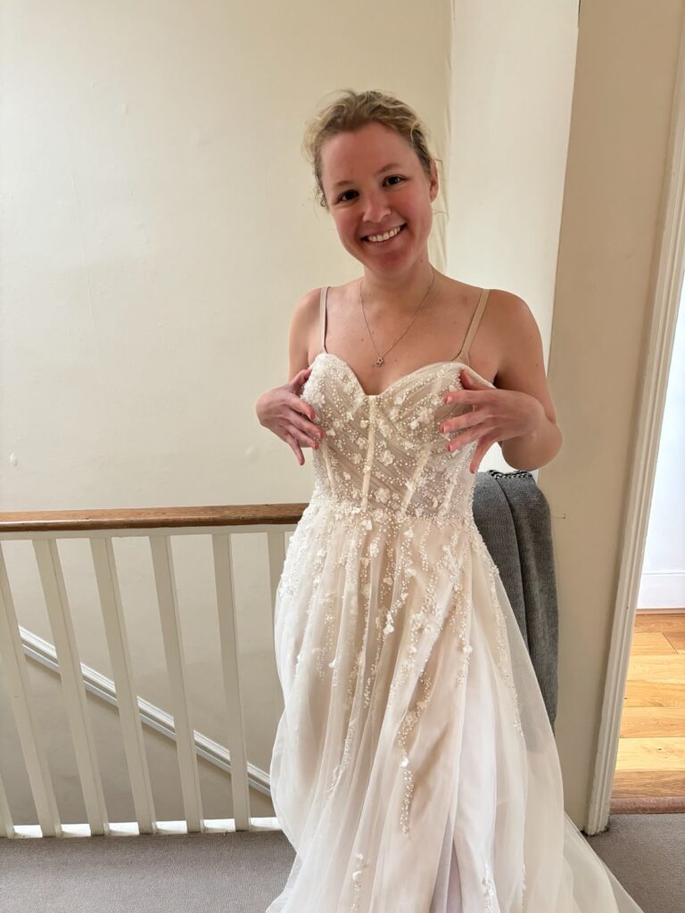 huge before alterations off the peg store bought sample justin Alexander bridal dress.