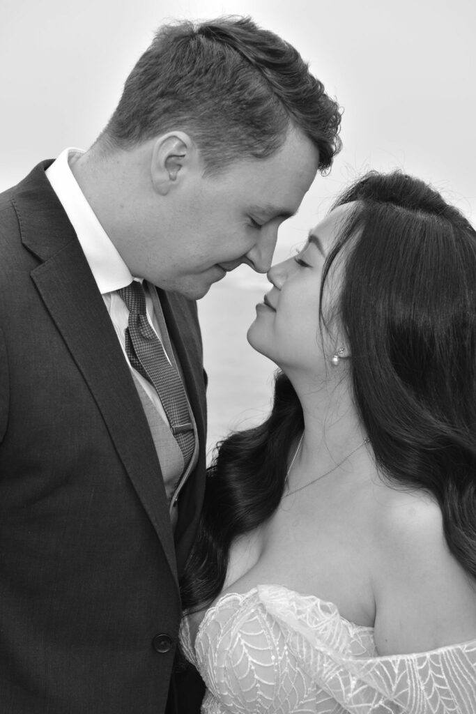 Petite bride wearing altered Monreal Lindsay wedding dress with bespoke Bardot sleeves waist 3 size reduction and reconstruction 