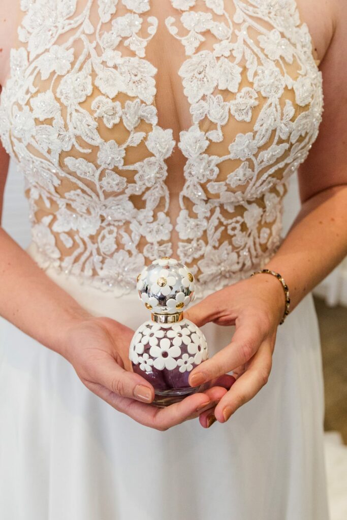 Redhill bride wearing altered Morilee wedding dress close up of underbust contouring