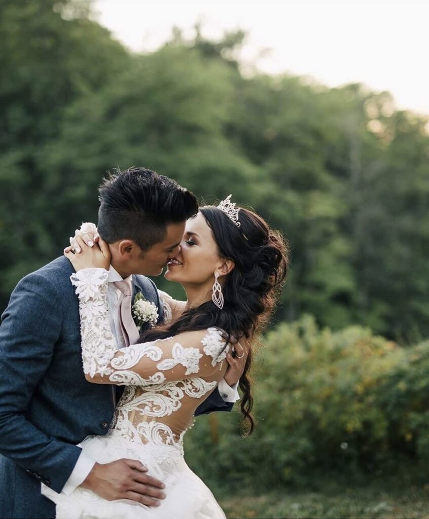 kissing bride and groom