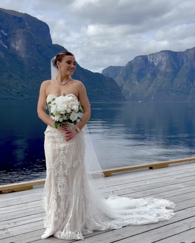 Back view of Martina Liana wedding dress with heavily beaded lace train in Aurland, Norway