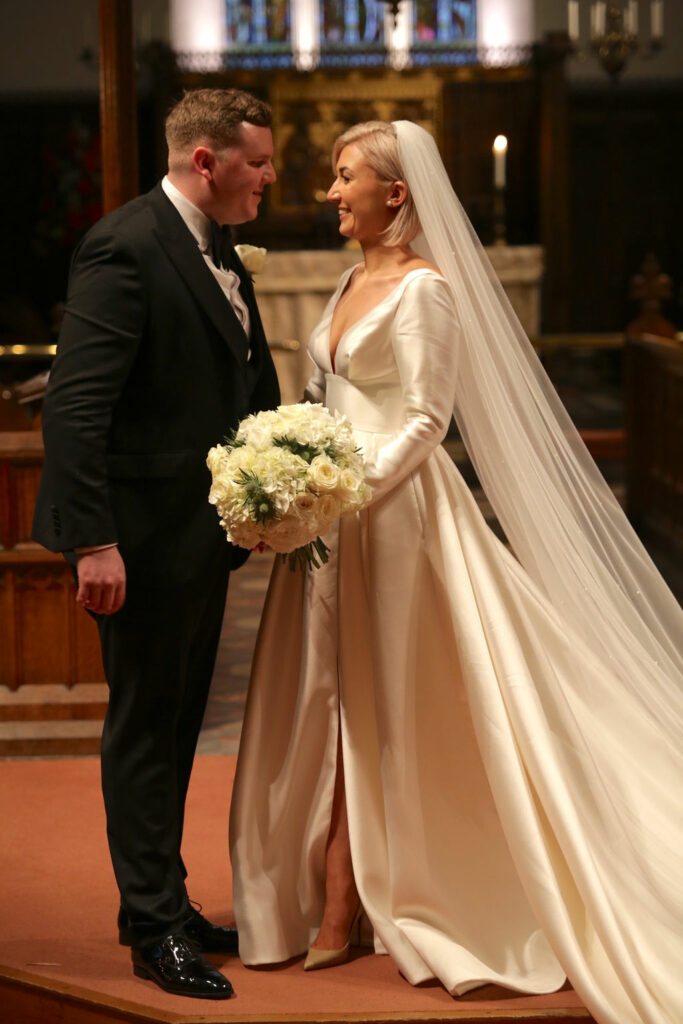 Leah De Gloria Bridal dress with bespoke sleeves and contouring done through couture alterations
