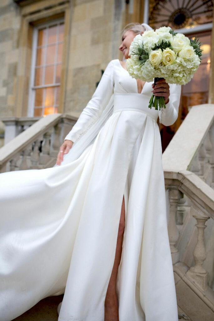 Leah Da Gloria wedding dress bridal alterations Knightsbridge with covered fabric buttons along closure of bespoke fitted sleeves
