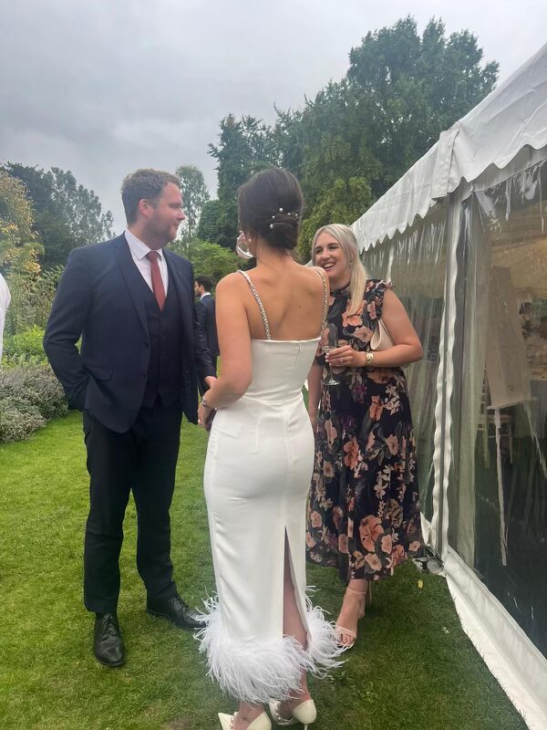 Made With Love wedding dress alterations featuring Ostrich Feathers