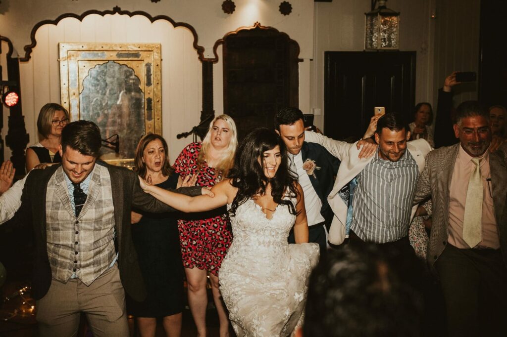 Wedding dress bustle allowing comfortable movement during the evening reception and party dancing