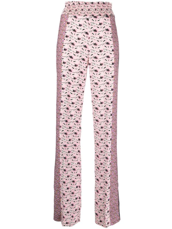 Prada trouser alterations London with bespoke floral embellishment created from original fabric