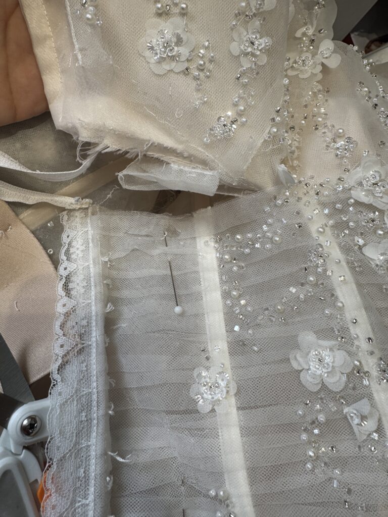 separating waist to allow zip to remain straight after alterations 