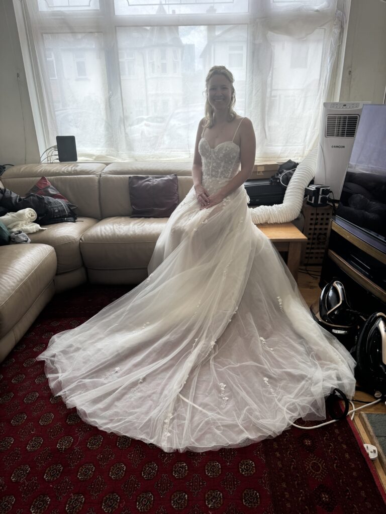 Reshaped bodice with smaller bust cups and added support justin Alexander Bridal alterations for a tooting bride.