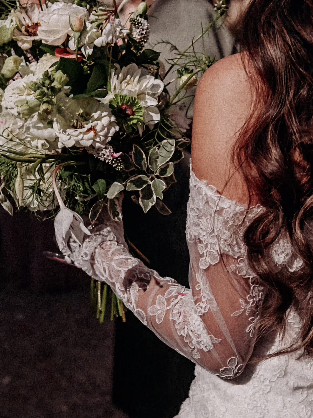 Beckenham bride wearing altered Martina Liana wedding dress with fitted lace sleeves detail during wedding