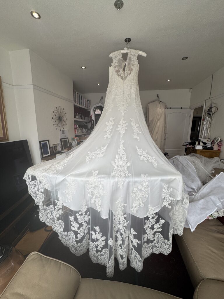Symphony of Venus lace wedding dress at her Cyprus destination wedding after expert bridal alterations in Sutton, Surrey