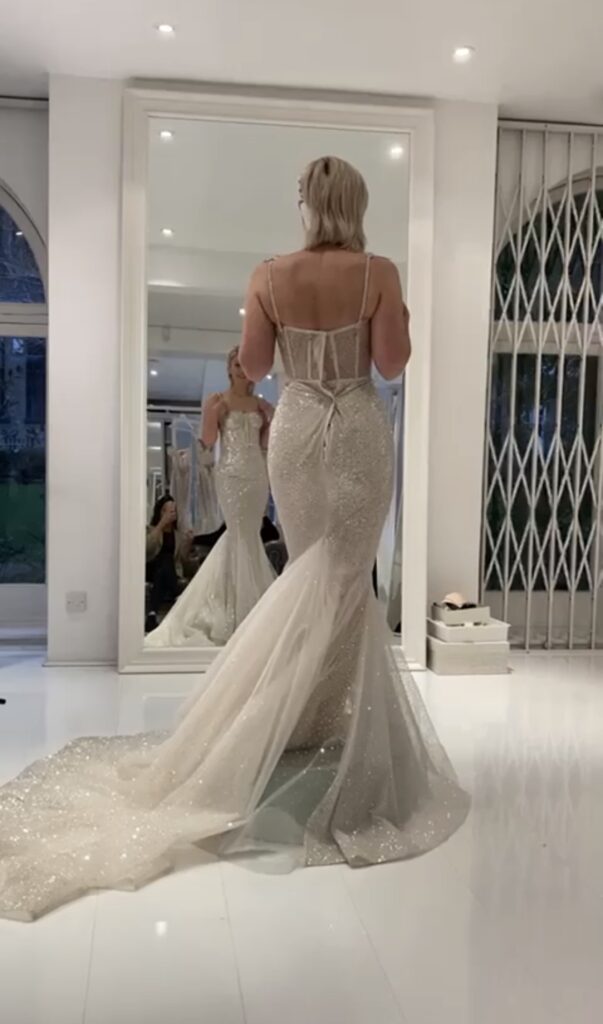 couture bridal alterations of this Berta Bridal Gown that fitted like a glove after alterations but before was loose as is shown here