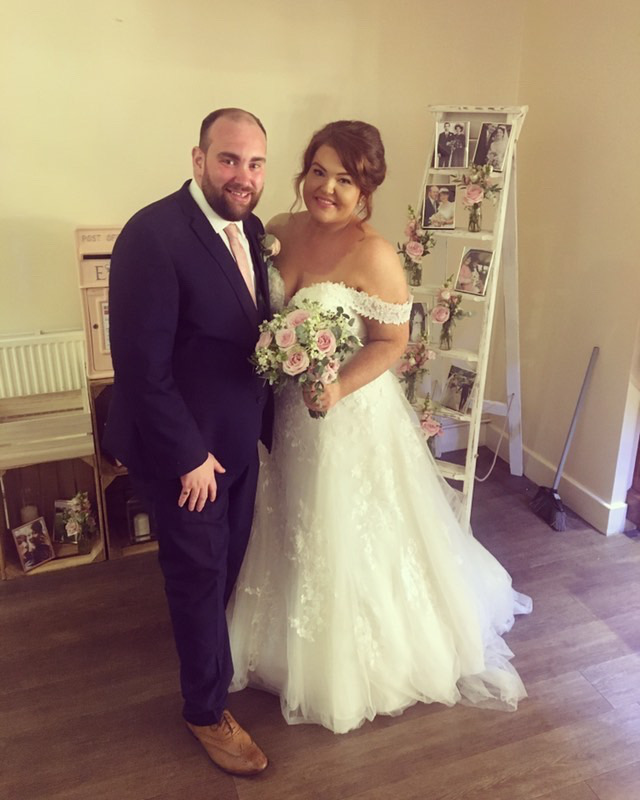 WED2B bridal alterations family referral wedding dress with corset support and bustle transformation