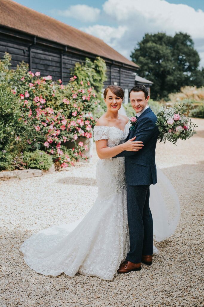 Bride wearing altered Anny Lin wedding dress during Surrey wedding ceremony