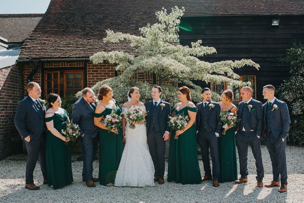 Bridesmaids wearing altered dresses during Surrey wedding ceremony all done at Tailoring & Alterations by Zen in Studio in Greater London Sutton, Surrey 