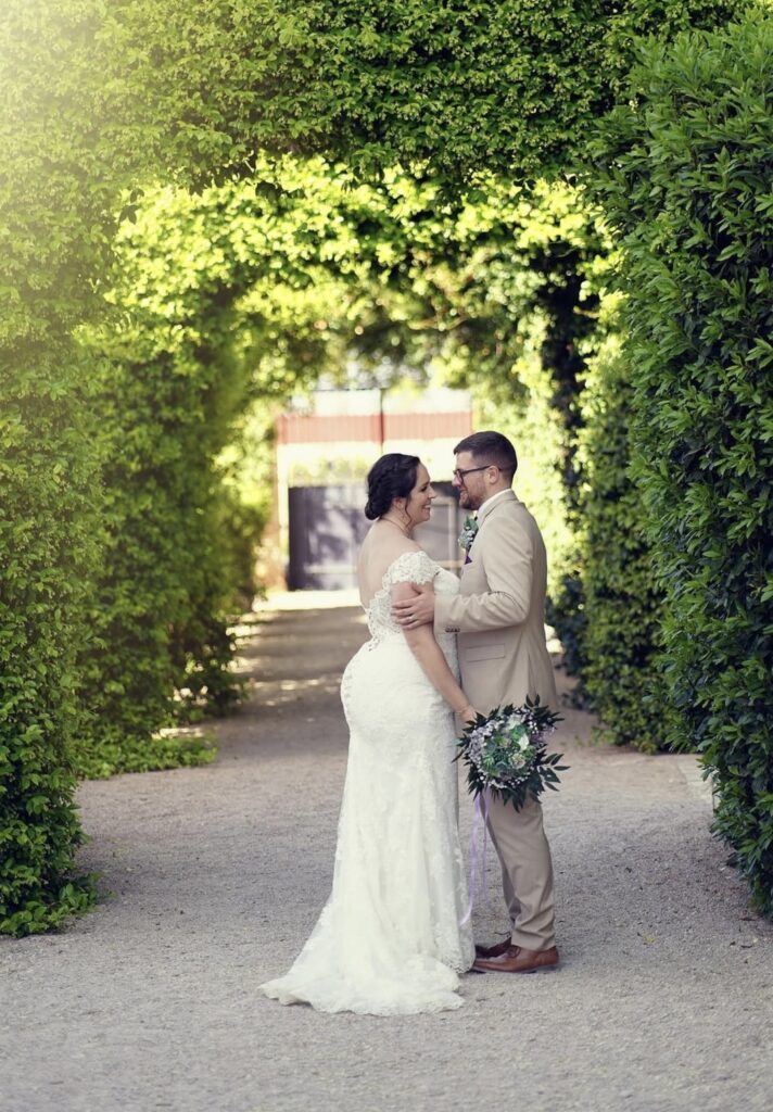 Bride and groom portrait following specialist bridal alterations for a Morden wedding