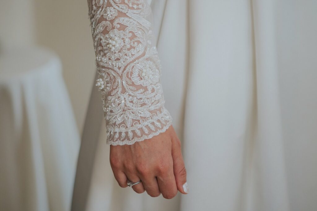 arm hem detail Couture pattern drafting for a bespoke illusion bridal bolero created from scratch