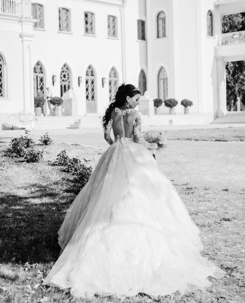 Julia Kontogruni bridal alterations ballgown featuring a bespoke 50-point bustle transformation for the evening reception