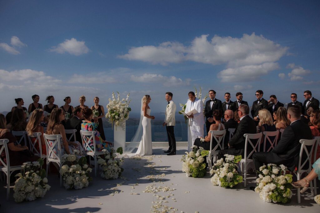 Fulham Bride wearing a Duke by Khya Studios wedding dress after expert Khya bridal alterations for her Santorini destination wedding.