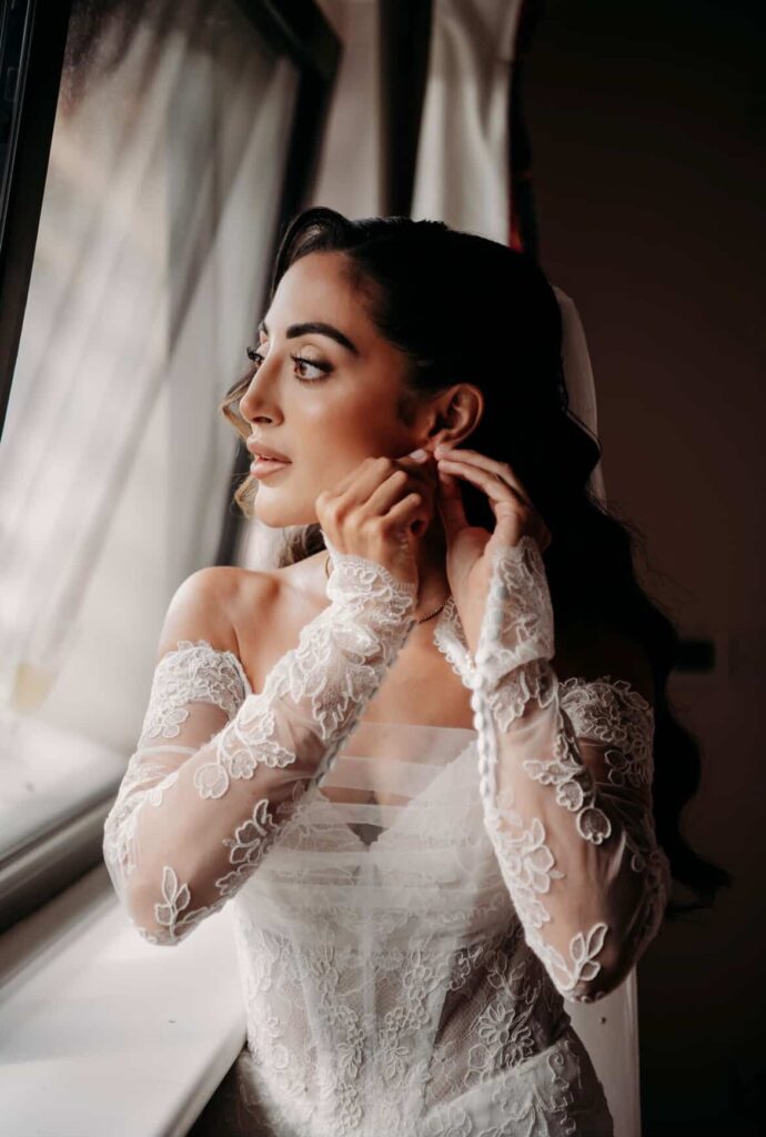 Martina Liana wedding dress after bridal alterations including sleeve fitting and bespoke corset modifications close up