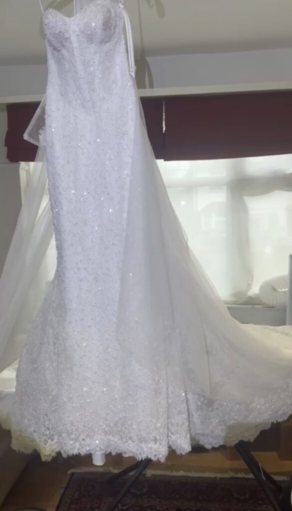 steam pressed wedding dress and veil ready for collection 