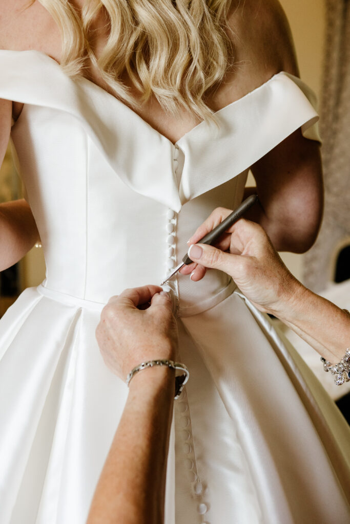 Back view of wedding dress weight loss following three-size reduction alterations