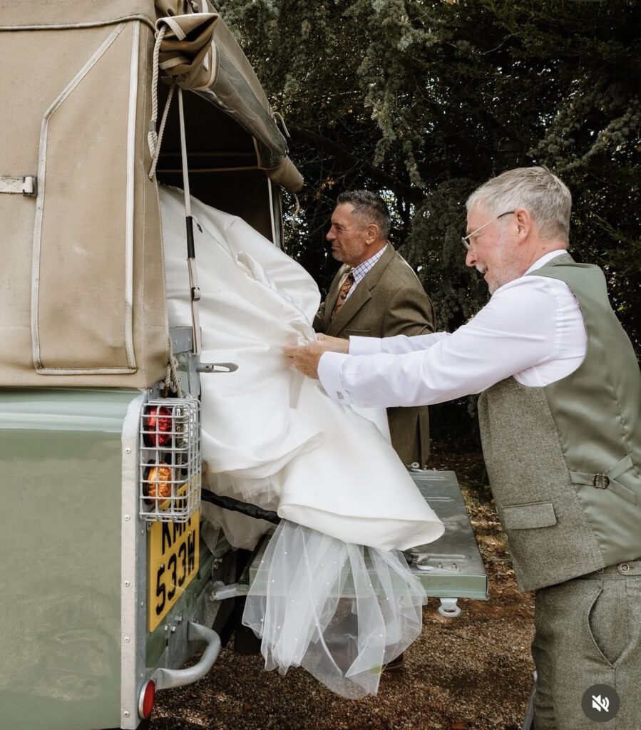 Bride transported in a truck outdoor wedding ceremony