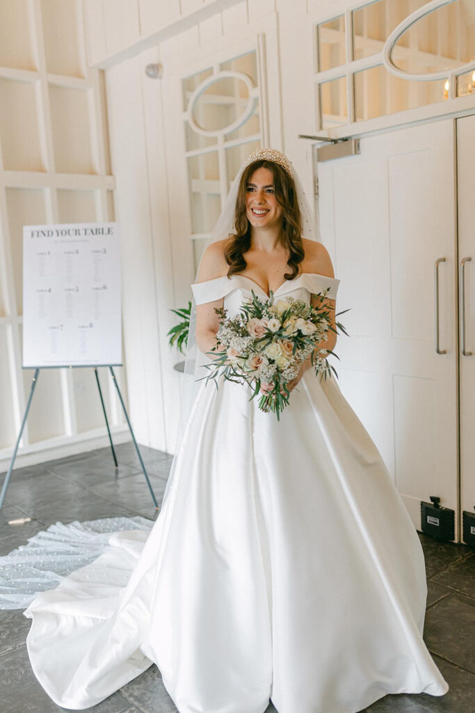 Bride wearing a Stella York wedding dress following couture bridal alterations and precision fitting.