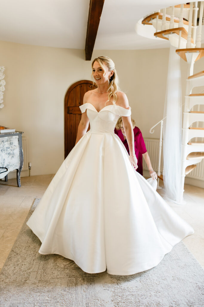 Stella York wedding dress extreme weightloss bride following three-size reduction alterations to a perfect fit
