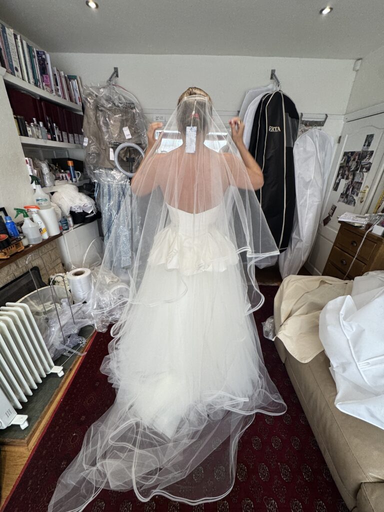 Final fitting of a Vivienne Westwood Raven corset top with a Bridal Rouge Gallery skirt before the wedding
