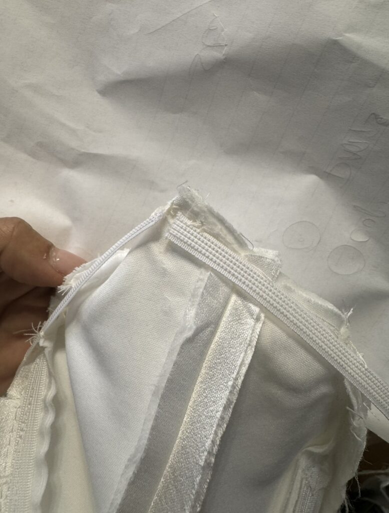 Internal boning added inside KYHA Studios Miles wedding dress during couture bridal alterations