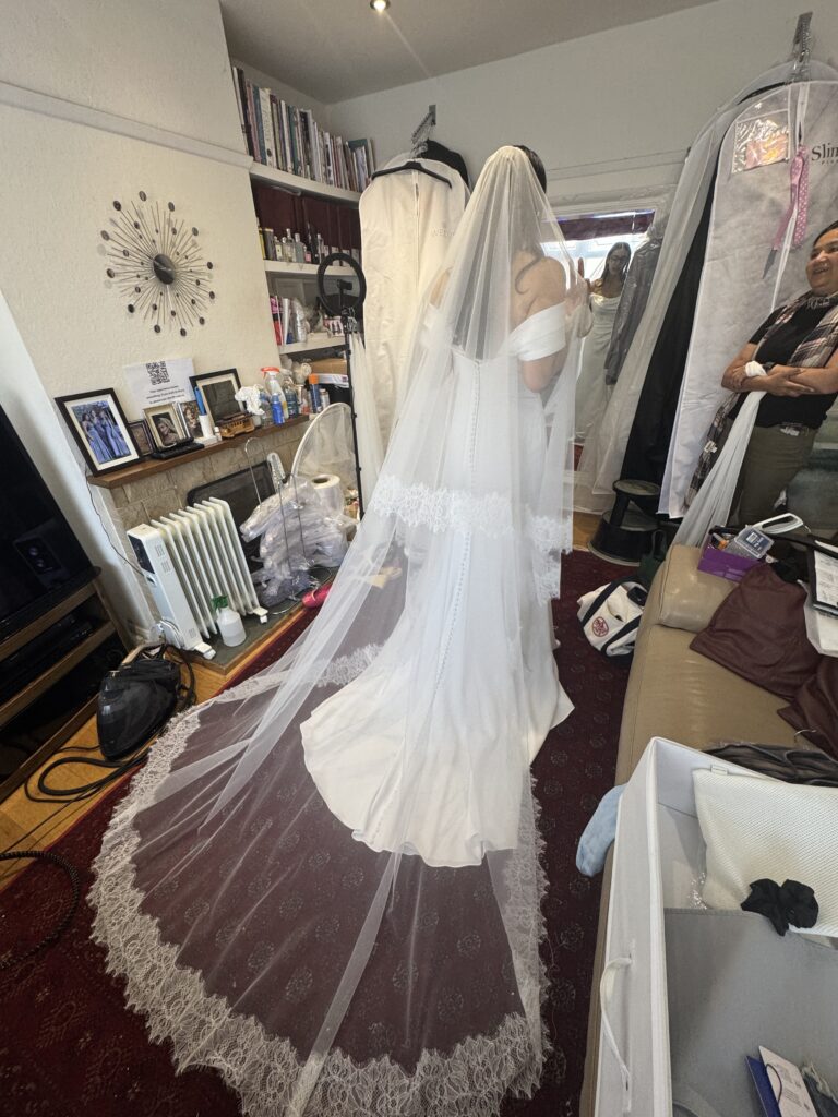 WED2B Luka wedding dress and cathedral veil looking perfect on Bride from Chiswick mother of bride Wallington