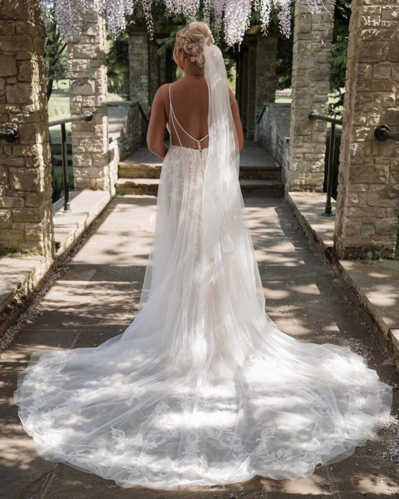 Essense of Australia wedding dress after couture alterations by an expert bridal alterations seamstress full back view