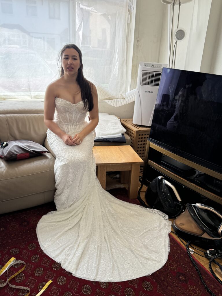 Milla Nova Bethel wedding dress after couture bridal alterations with one-size waist reduction, bust contouring, hem shortening and professional steam pressing for a Hammersmith bride at my Sutton Studio in Greater London.