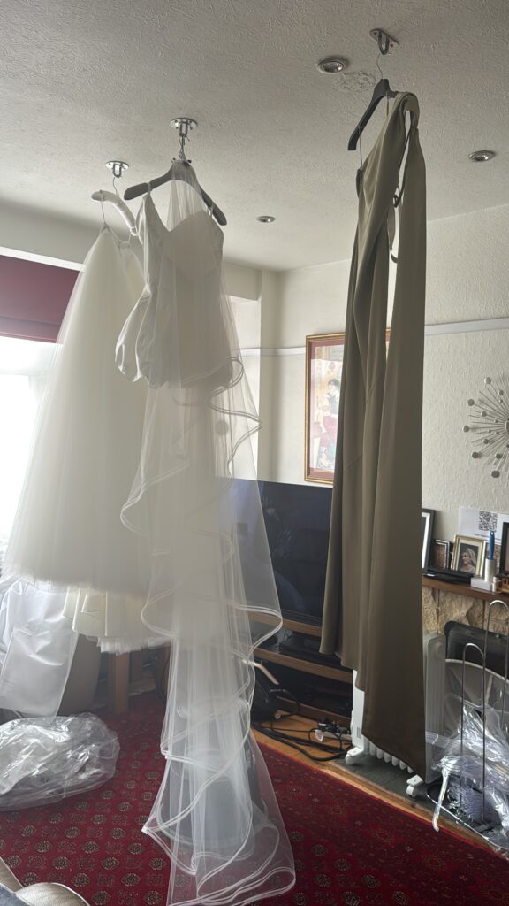 Final professional steam press collection of a Vivienne Westwood Raven corset top with a Bridal Rouge Gallery skirt before the wedding