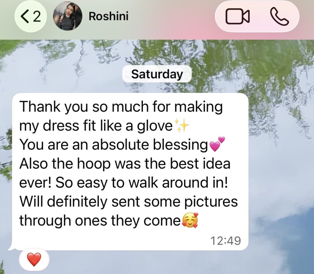 Bride praising the bridal hoop recommendation after couture bridal alterations.