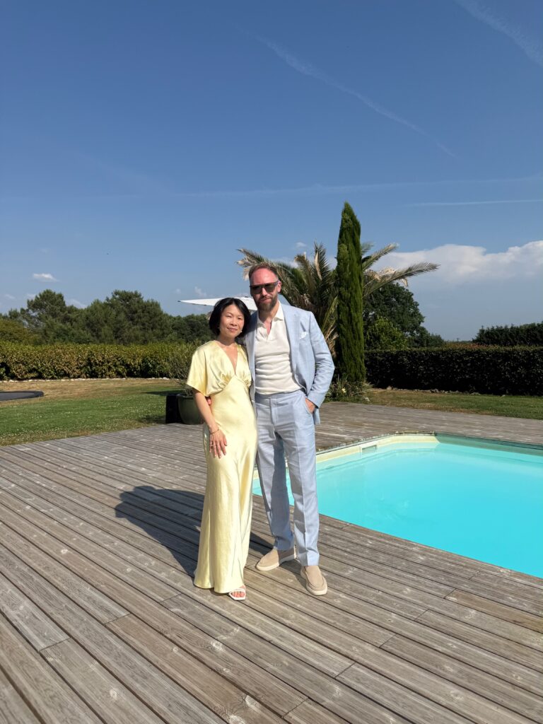 Bridesmaid wearing an altered satin dress at Château Fengari France after alterations by my Sutton studio