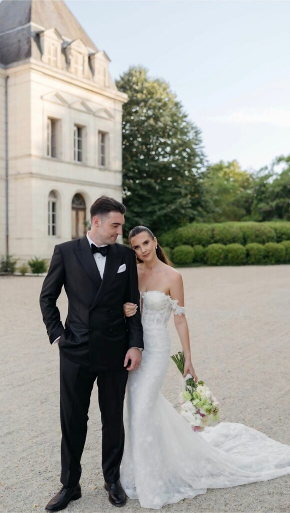 Outdoor wedding ceremony at Château Fengari with the bride wearing her altered Ricca Sposa Como gown