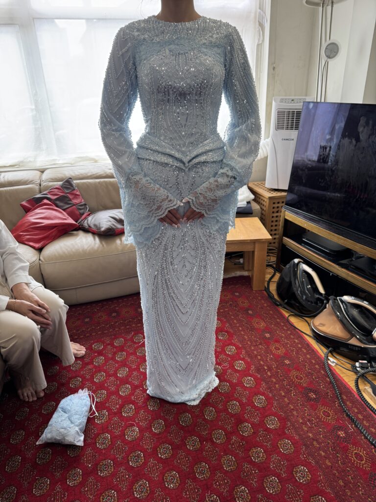 Engagement Beaded Dress Alterations with bespoke lace addition and sleeve modification, softened bodice and hem with hand applied lace to make the whole look perfectly cohesive.