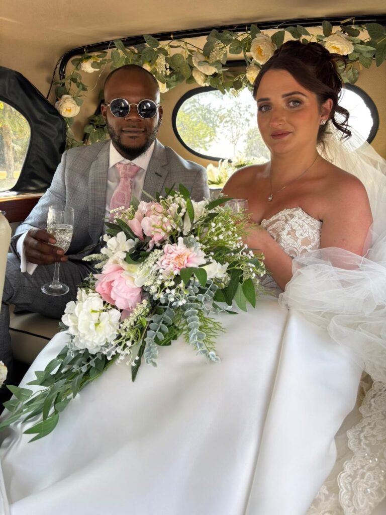 Bride wearing her Essense of Australia wedding dress after professional bridal alterations on her wedding day to a perfect fit.
