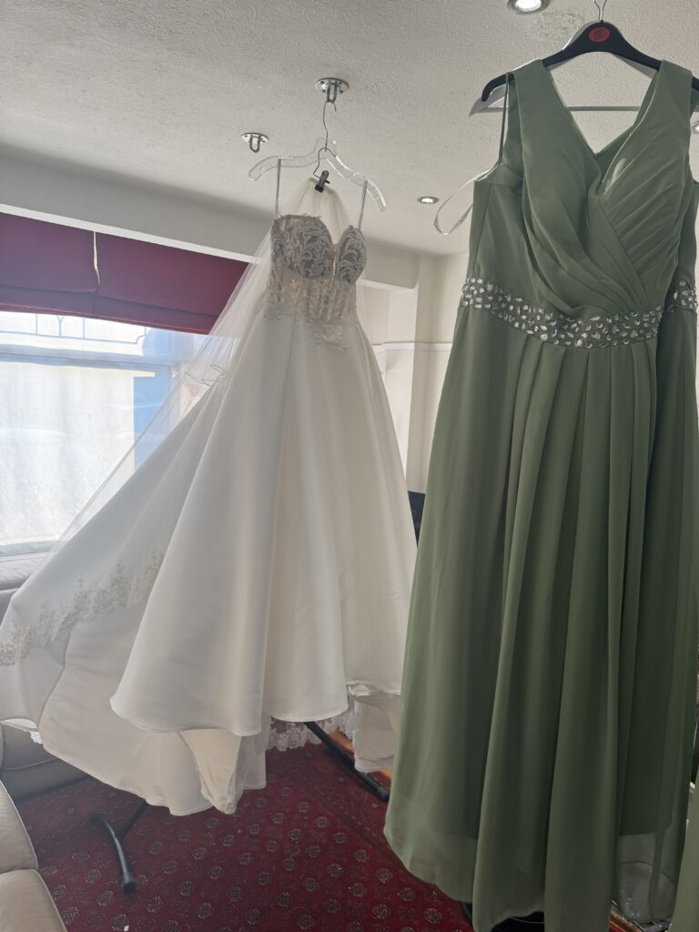 Essense of Australia wedding gown with bespoke alterations showing the finished bridal dress professional comprehensive steam press all wedding outfits.