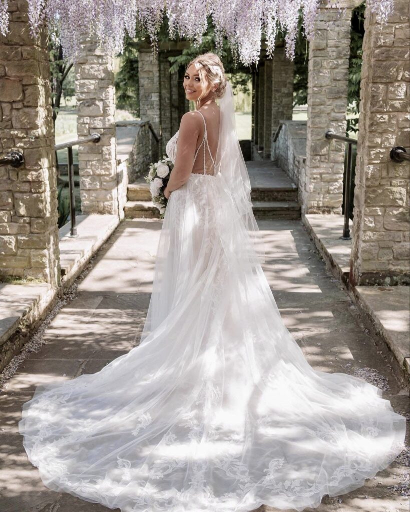 Essense of Australia wedding dress after couture alterations by an expert bridal alterations seamstress