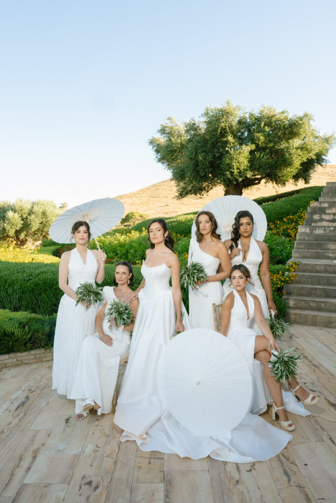 Precision shortening of KYHA Miles satin wedding dress to achieve the perfect bridal length.