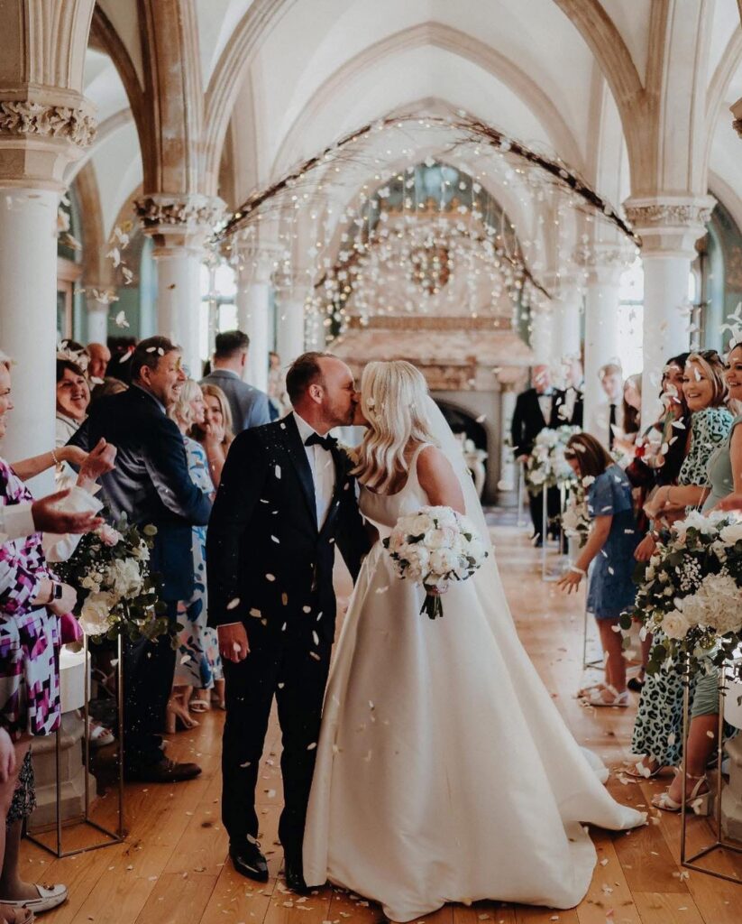Real bride wearing her wedding dress on her wedding day.