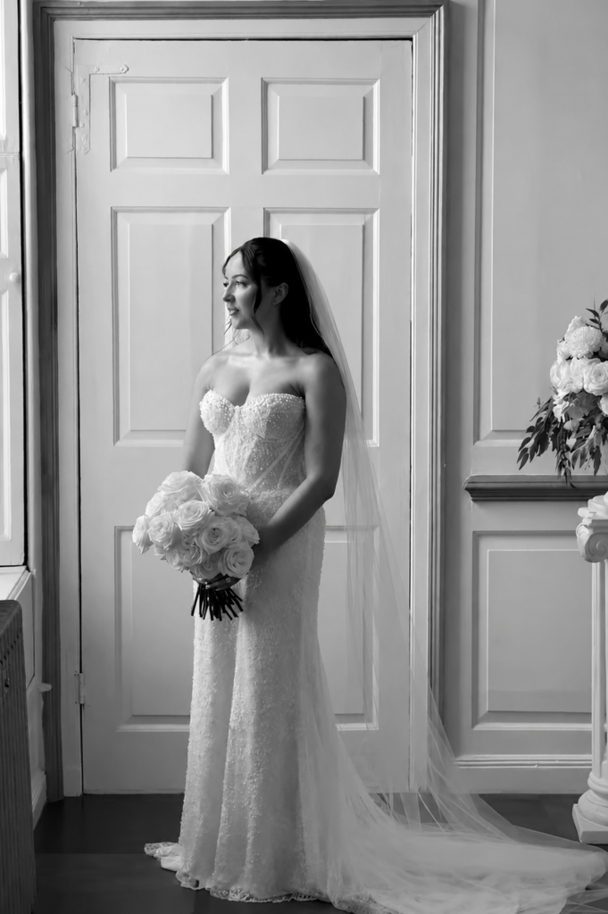 side view of the Milla Nova Bethel gown showing expert one-size waist reduction through the centre back zip.