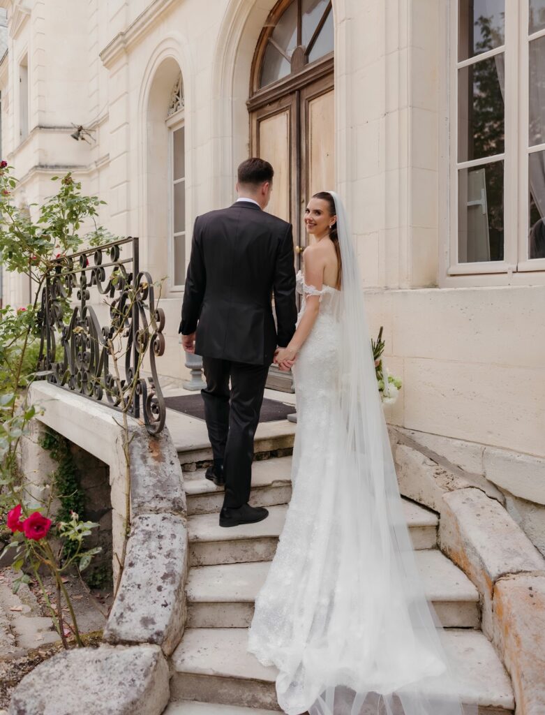husband and wife walking hand in hand.